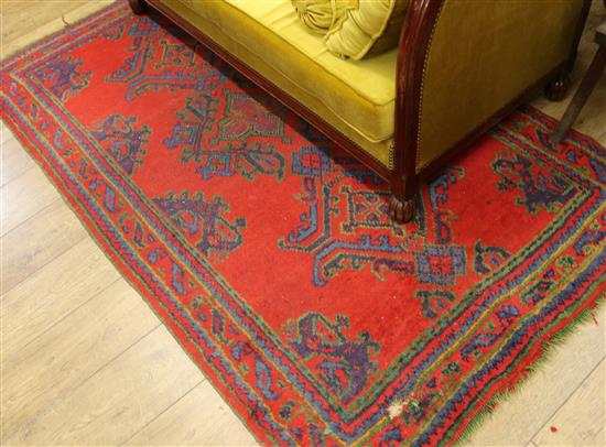 A red turkey rug 210 x 123cm
